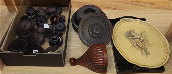 A collection of wooden vase stands, trays, etc.